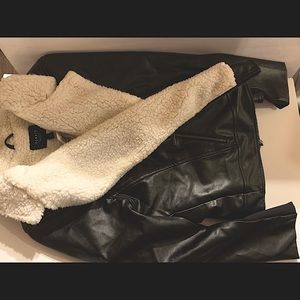 Fabulous fashion faux leather w/ white lining Coat